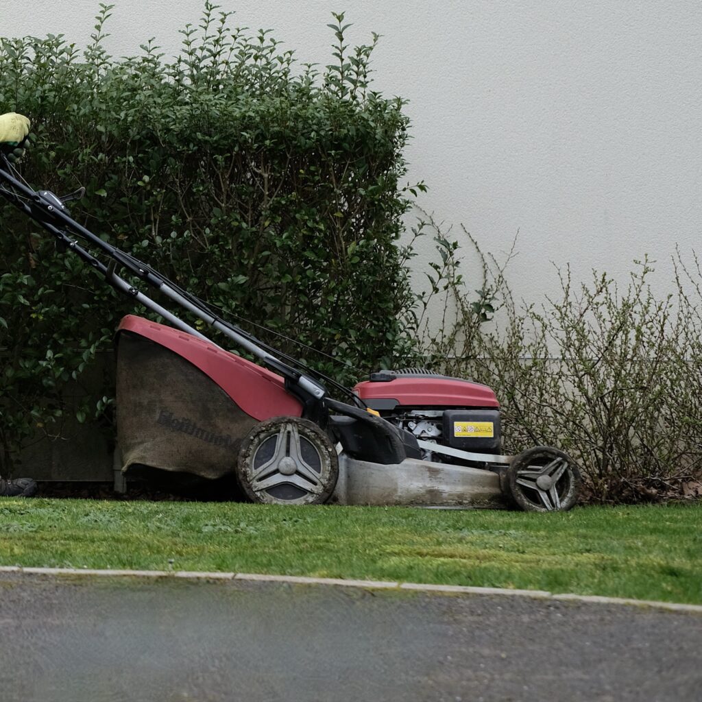 Cutting the grass with a mower